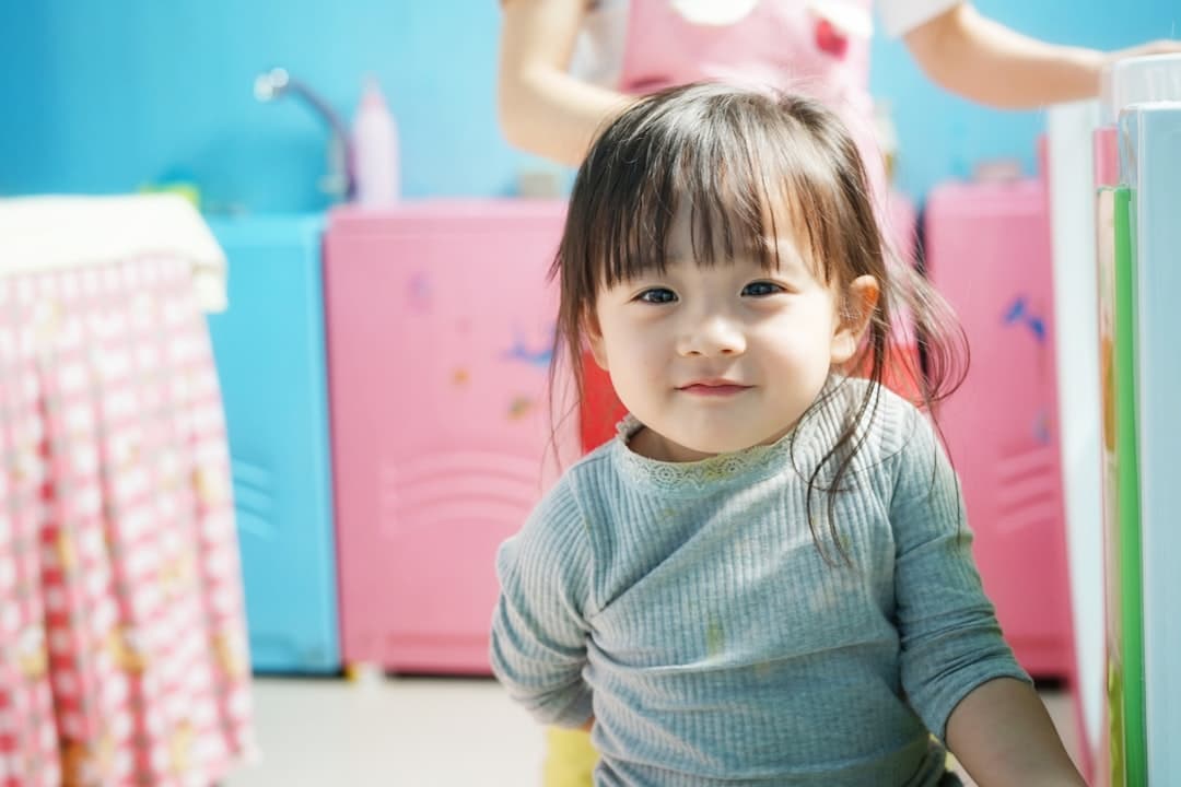Kindergarten teacher teaching children